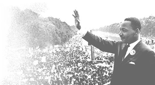 Martin Luther King Jr. hand out in front of the crowd